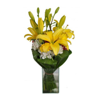 Arranjo de Lírios Yellow no Vidro Médio